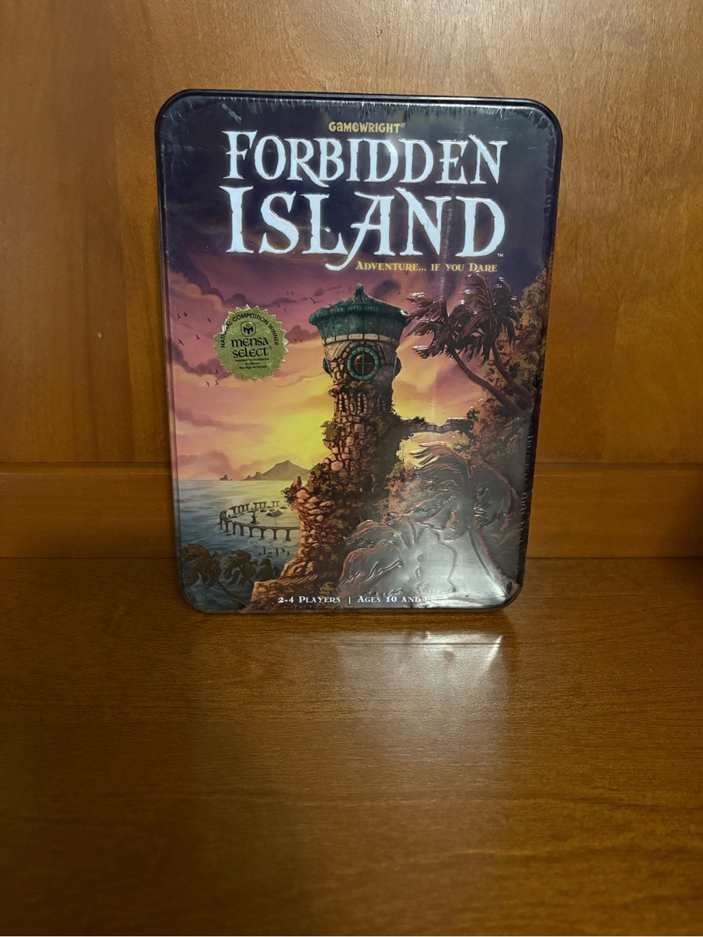 Forbidden Island Cooperative Board Game - Purple and Orange Tin